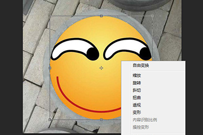 Photoshop在井盖上涂鸦的操作方法